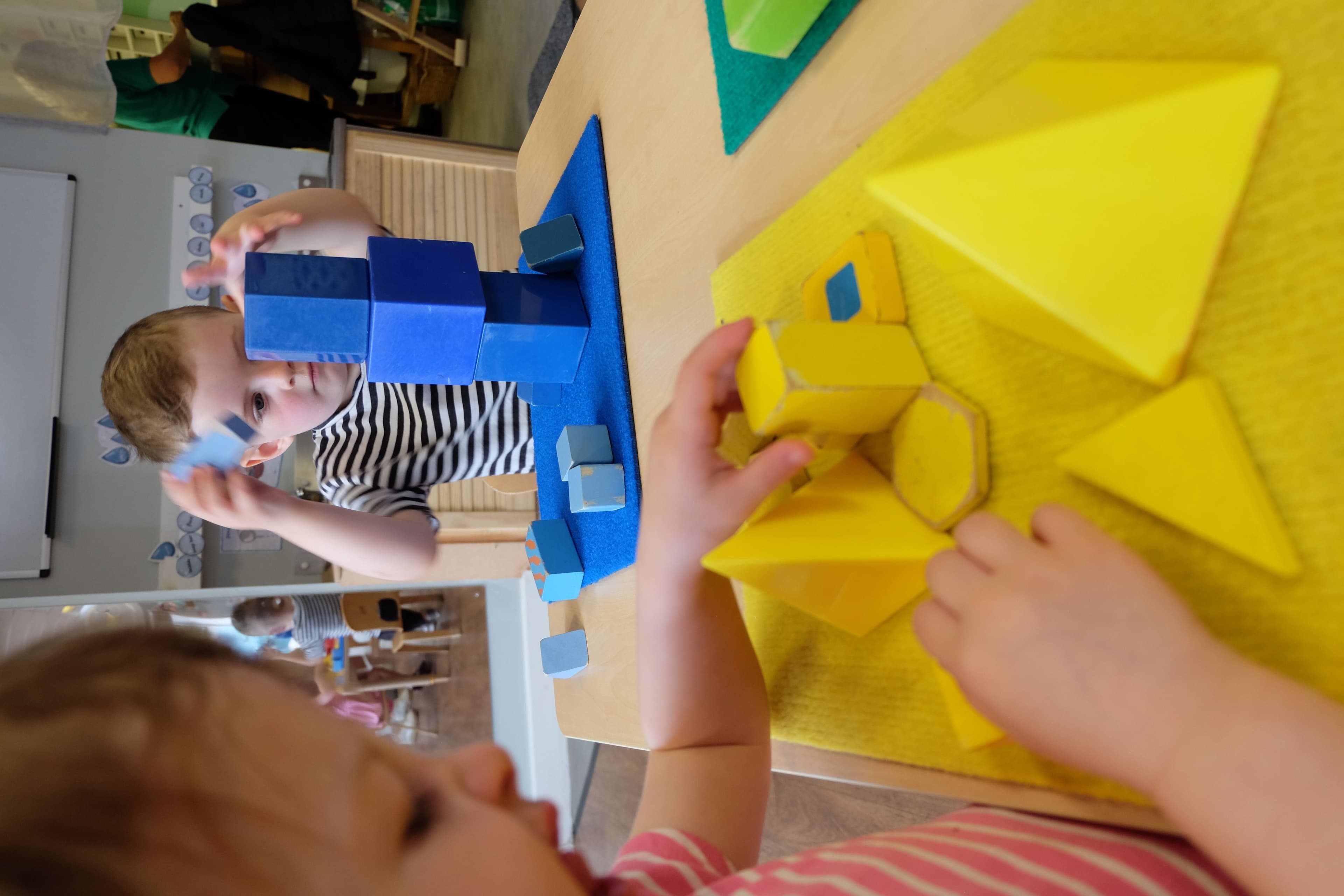 Children exploring activities and learning materials